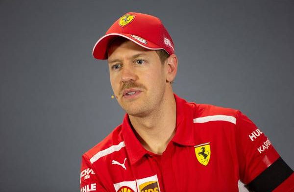 Did Vettel's moustache slow him down? Reporter jokes with the Ferrari driver