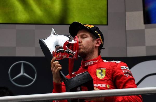 Vettel says Ferrari are aiming for three wins to end the season