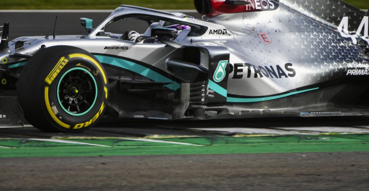 The first image of Lewis Hamilton behind the wheel of the W11!
