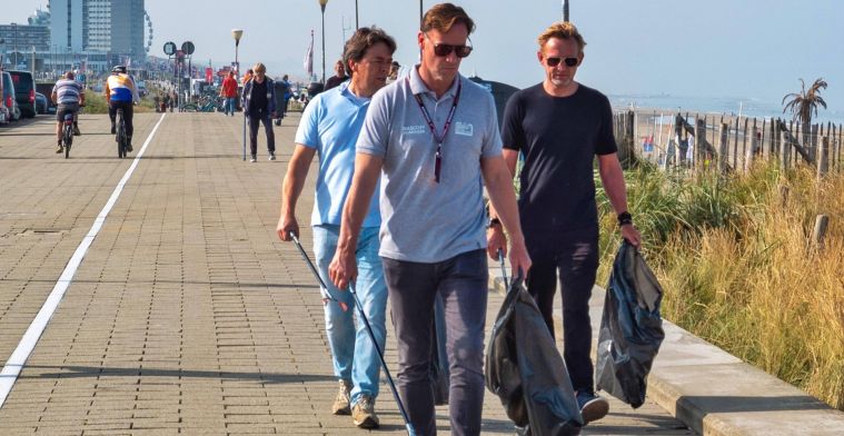 Dutch prince and Zandvoort director pick up trash after the Dutch GP
