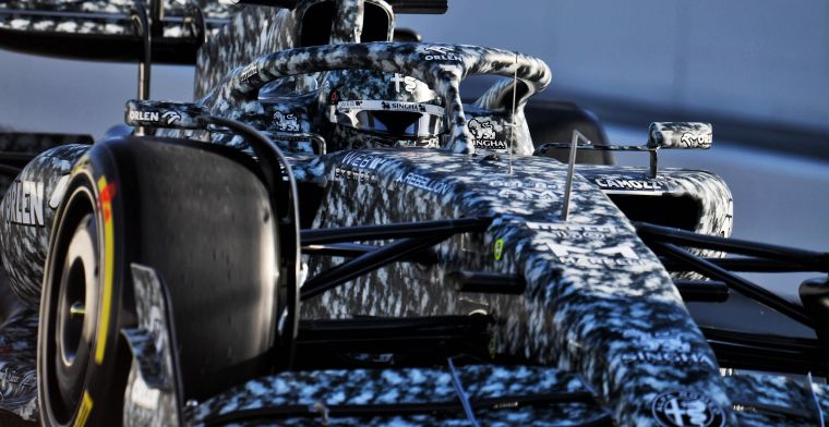 Camouflage livery typical of morning for Alfa Romeo with only four laps